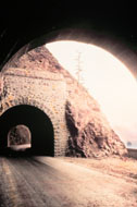 Mosier Twin Tunnels as seen in the 1920s. © Oregon Department of Transportation