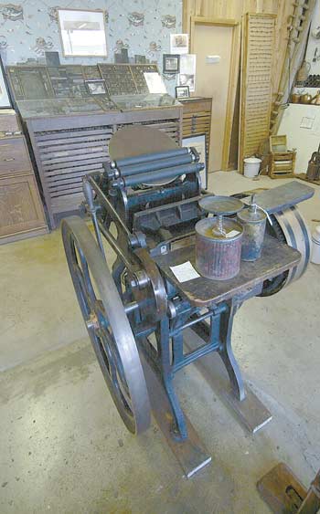 An old printing press and hand type used to print the Coquille Valley Sentinel newspaper and other jobs are on display at the Coquille Valley Museum.