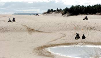 Riding the dunes on a rail or on a ATV can be lots of fun but be aware of the shifting sands.